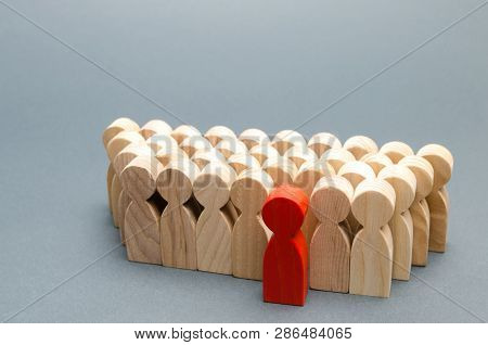Red Man Coming Out Of The Crowd. The Chosen Person Among Others. A Talented Worker. Promotion. Conce