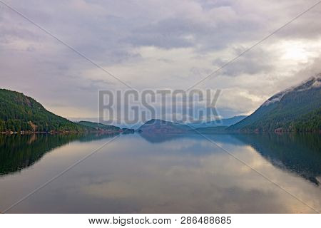 Morning fog in the mountains around Sproat lake in Vancouver Island, British Columbia, Canada