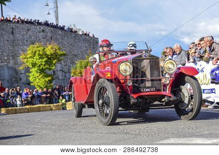 Amelia, Italy, May 2018. Mille Miglia (1000 Miles), Historical Vintage Car Race. Two Men Driving A H