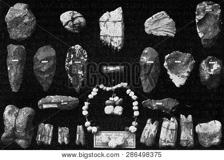 Objects of art in flint and bone ornaments from the diluvial deposits of the Somme Valley, vintage photo. From the Universe and Humanity, 1910.
