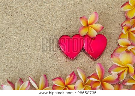 Frangipani /plumeria Flower Frame, With Two Red Hearts On Sand