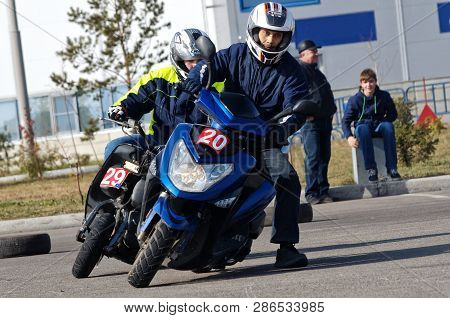 Magnitogorsk, Russia, - September, 28, 2014. Members Of The Club Of Fans Of Scooters Spend Training 