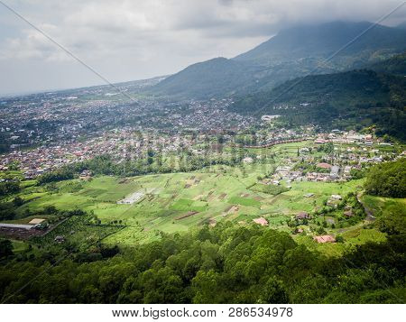 Aerial View Of Forest Nature At Batu Malang City In East Java, Indonesia. One Of The Best Destinatio