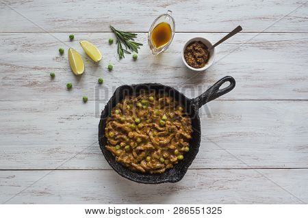Keema Beef Curry - Indian Dish With Meat, Green Peas And Curry Sauce.