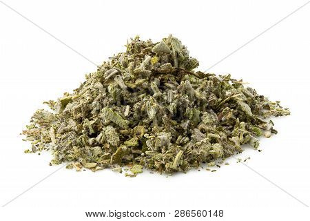 A Pile Of Dried Rubbed Sage Isolated On White.