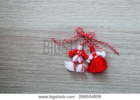 Bulgarian Traditional Spring Decor Martenitsa, Wooden Background. Baba Marta Holiday, Backdrop.