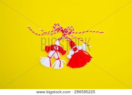 Bulgarian Traditional Spring Decor Martenitsa, Isolated On Yellow Background. Baba Marta Holiday, Ba