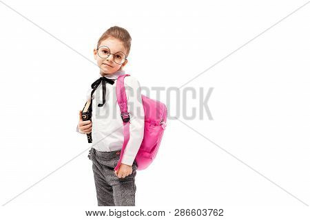 Back To School. Beautiful Little Girl Dressed Like A School Girl - In White Shirt And Gray Pants, Ro