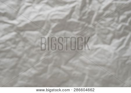 White Paper Wrinkled Texture For Background And Copy-space. Crumpled Parchment Or Baking Paper For B