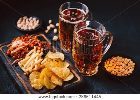 Beer And Snacks. Bar Table. Restaurant, Pub, Oktoberfest Food. Craft Lager Drink, Chips, Pork Ears, 
