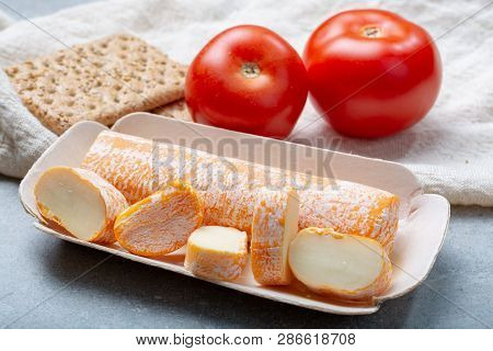Fagotin Cheese With  Orange Coloured Rind Made From Cow Milk In Caves Of Maredsous Abbey, Belgium
