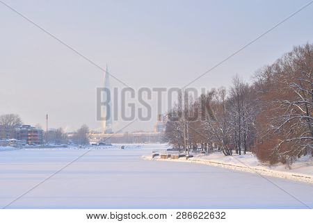Frozen Neva River On The Outskirts Of St. Petersburg At Sunny Winter Day, Russia.