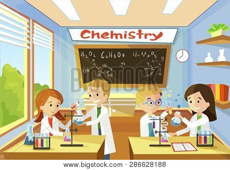 Elementary Class School Of Chemistry. Little Children At Desk Doing Research And Study Boy In Hand H
