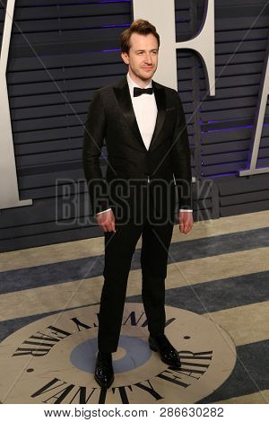 LOS ANGELES - FEB 24:  Joseph Mazzello at the 2019 Vanity Fair Oscar Party on the Wallis Annenberg Center for the Performing Arts on February 24, 2019 in Beverly Hills, 