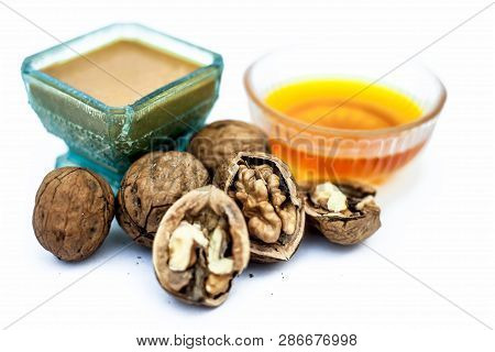 Close Up Of Best Home Remedy To Treat Anemia In A Glass Bowl Isolated On White Consisting Of Walnut