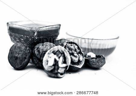 Close Up Of Best Home Remedy To Treat Anemia In A Glass Bowl Isolated On White Consisting Of Walnut