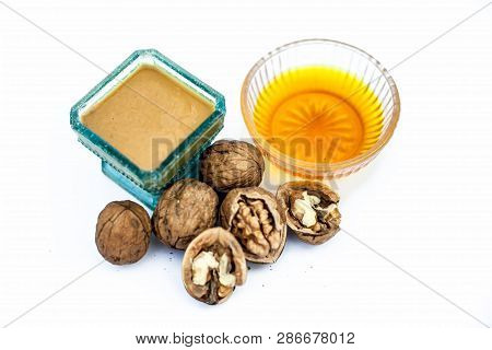 Close Up Of Best Home Remedy To Treat Anemia In A Glass Bowl Isolated On White Consisting Of Walnut