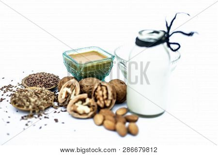 Close Up Of Face Mask Or Face Pack Of Walnut Along With Flax Seed Or Alsi, Almonds,yogurt And Milk I