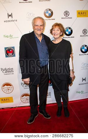 Bill Smitrovich and Shaw Purnell arrive at The Rafi 2019 Pre-Oscars Gifting Lounge at the Waldorf Astoria Hotel, Beverly Hills, CA on Feb. 22, 2019.