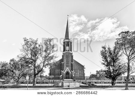 Fraserburg, South Africa, August 7, 2018: A Street Scene, With The Dutch Reformed Church, In Fraserb