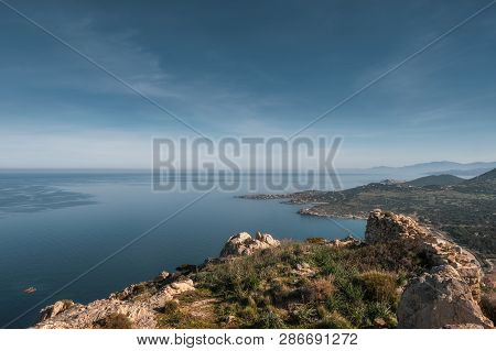Coast Of Corsica Viewed From Rocky Mountain Outcrop