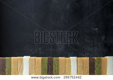 Tower Stack Of Different Kinds Of Handmade Soaps