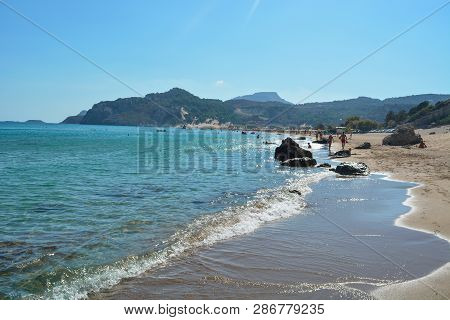 The Tsambika Beach With Fine Golden Sand On Summer Days, Rhodes Island, Greece.