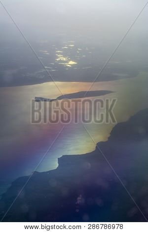 Aerial Landscape With Golden Light Over Lake Vattern With Visingso Tainted In Rainbow Colors In Swed