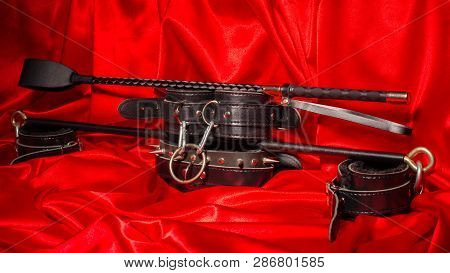 Close Up Bdsm Outfit. Bondage, Kinky Adult Sex Games, Kink And Bdsm Lifestyle Concept With A Pair Of