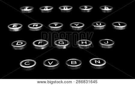 Vintage Antique Typewriter Keys On A Black Background Isolated