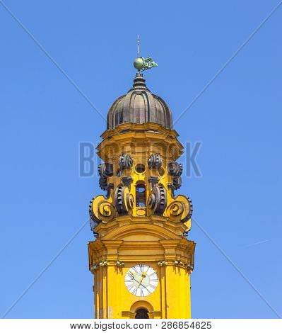 Clocktower Of Famous Theatine Church In Munich