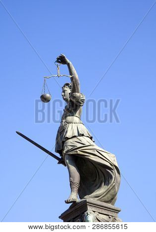 Statue Of Lady Justice In Front Of The Romer In Frankfurt - Germany