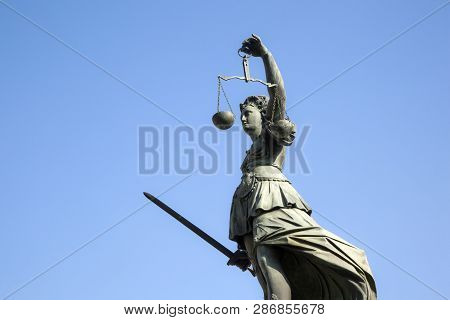 Statue Of Lady Justice In Front Of The Romer In Frankfurt - Germany