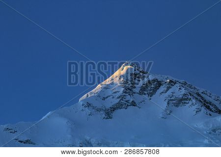 Peak Of Bahara Shikhar, Mountain Of The Annapurna Range In Snow