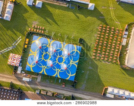 Aerial Detail Of Festival Site With Toilets, Picknick And Restaurant Area. Crowd Management Concept.