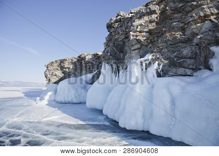Large Icicles. Lake Baikal. Winter Frozen Nature