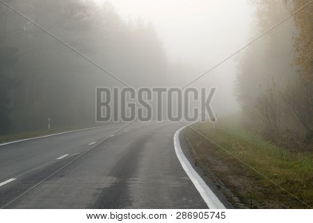 Driving On Countryside Road In Fog. Illustration Of Dangers Of D