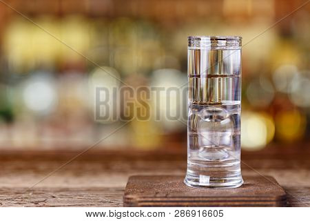 Original Cocktail Shot Of Audi With Poured Layers Of Sambuca, Coconut And Citrus Liqueur, White Rum,