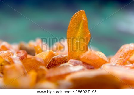 Macro Close Up Of An Amber Stones From Baltic Sea. Multicolored
