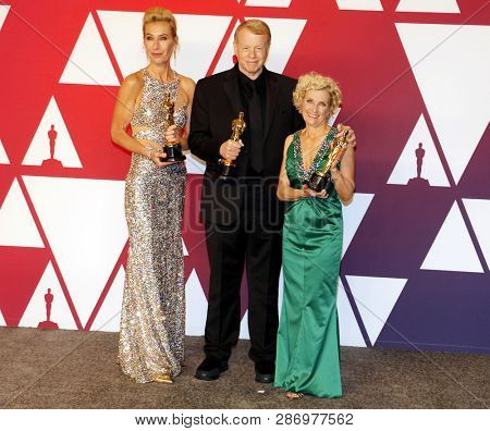 Kate Biscoe, Greg Cannom and Patricia Dehaney at the 91st Annual Academy Awards - Press Room held at the Loews Hotel in Hollywood, USA on February 24, 2019.