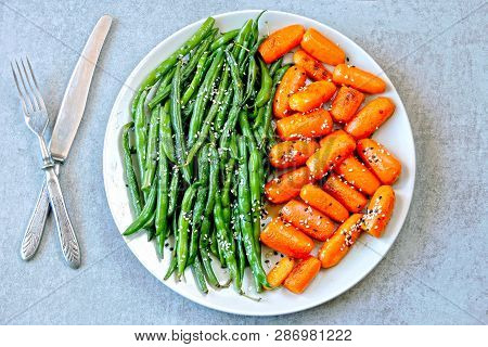Healthy Food On A Plate. Green String Beans And Baby Carrots, Cooked On The Grill. Vegan Lunch. Usef