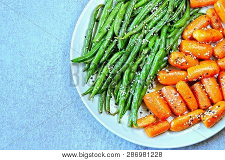 Healthy Food On A Plate. Green String Beans And Baby Carrots, Cooked On The Grill. Vegan Lunch. Usef