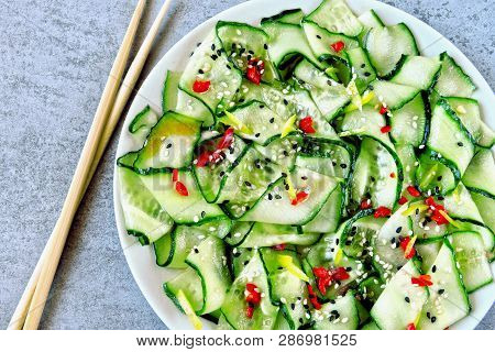 Cucumber Salad In Chinese Style. Salad With Cucumbers And Chili Pepper. Chinese Salad With Cucumber.