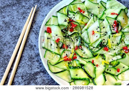 Cucumber Salad In Chinese Style. Salad With Cucumbers And Chili Pepper. Chinese Salad With Cucumber.
