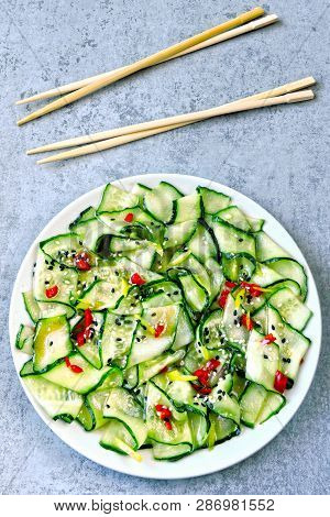 Cucumber Salad In Chinese Style. Salad With Cucumbers And Chili Pepper. Chinese Salad With Cucumber.