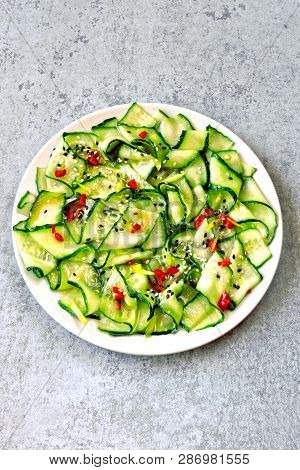 Cucumber Salad In Chinese Style. Salad With Cucumbers And Chili Pepper. Chinese Salad With Cucumber.