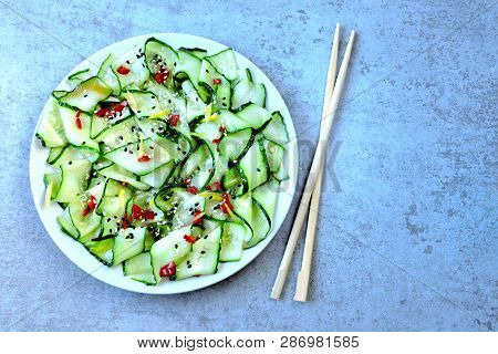 Cucumber Salad In Chinese Style. Salad With Cucumbers And Chili Pepper. Chinese Salad With Cucumber.