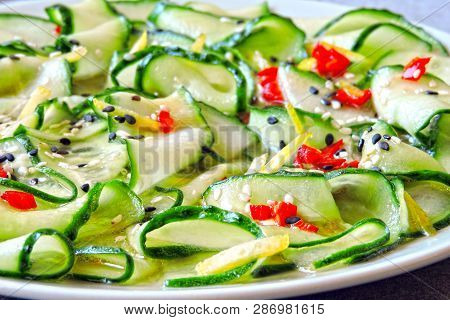Cucumber Salad In Chinese Style. Salad With Cucumbers And Chili Pepper. Chinese Salad With Cucumber.