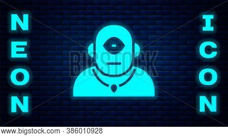 Glowing Neon Cyclops Icon Isolated On Brick Wall Background. Vector