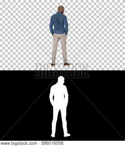 Arab In Casual Looking Around With Hands In Pockets, Alpha Chann